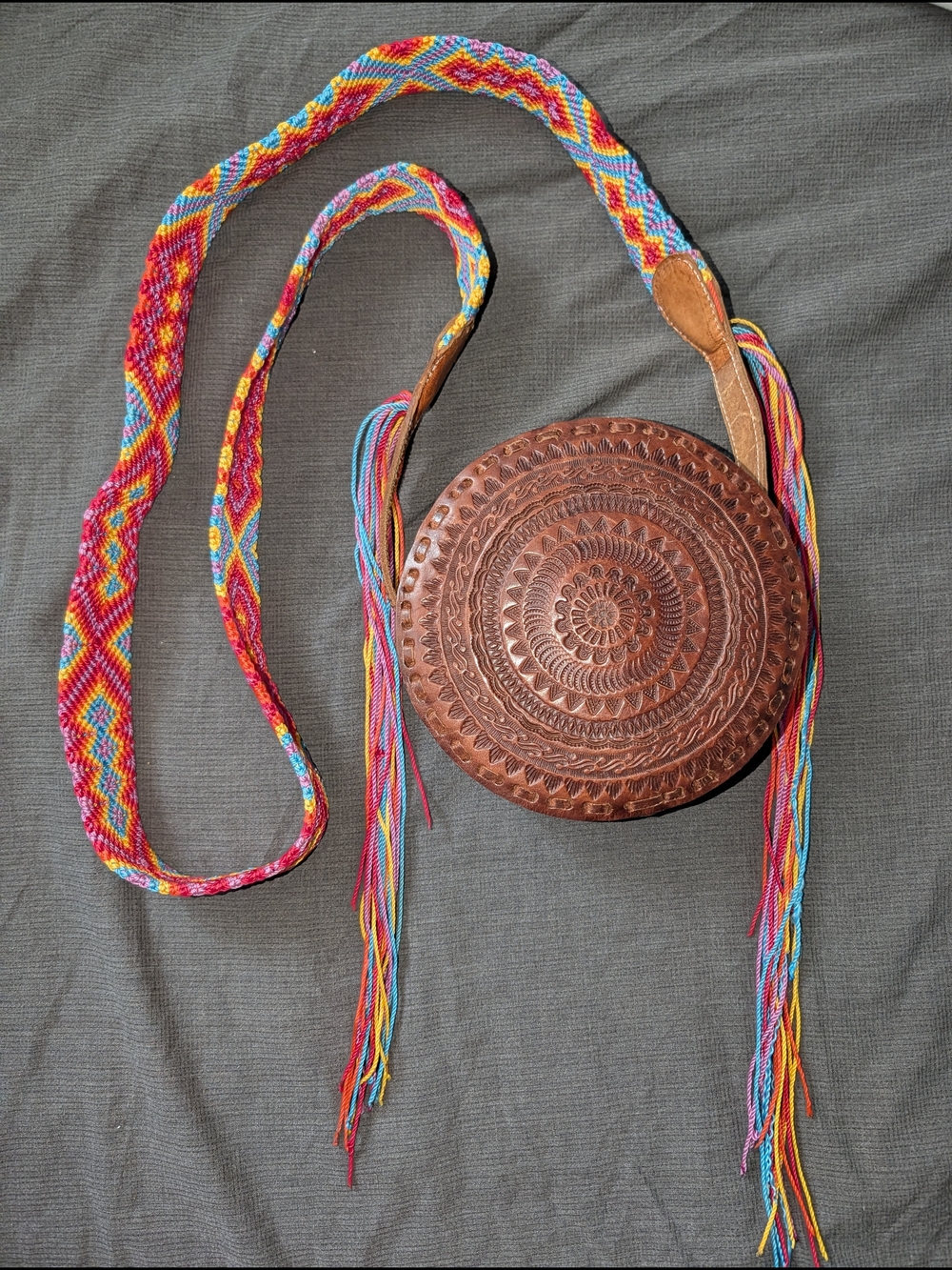 Handcrafted Brown Leather Round Crossbody Bag with Multicolor Woven Strap